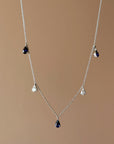I LOVE THE WAY THE ICICLES CATCH THE SUNLIGHT, SHARP AND WET // SAPPHIRE AND DIAMOND FRINGE NECKLACE