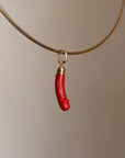 SHE'S JUST GOT THIS SMILE LIKE IT'S GOING WELL, YOU KNOW? // HAND CARVED ITALIAN CORAL PHALLIC CHARM