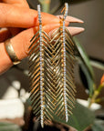 TRACING SHADOWS ON YOUR SKIN AS THE WIND BLOWS SOFTLY // ARTICULATED FEATHER FROND EARRINGS