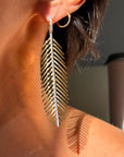 TRACING SHADOWS ON YOUR SKIN AS THE WIND BLOWS SOFTLY // ARTICULATED FEATHER FROND EARRINGS