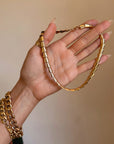 I MOVE SLOWLY AND WITH INTENTION LIKE A SNAKE WEAVING IN THE GRASSES // VINTAGE GOLD ARTICULATED CHOKER COLLAR