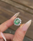 LAY WITH ME IN A FIELD OF FLOWERS // ANTIQUE EMERALD AND DIAMOND HALO RING