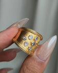 YOU'RE A SUPERNOVA // VINTAGE WIDE GOLD BAND WITH FANCY CUT DIAMONDS