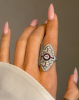 OF REASONS TO HAVE A SHIELDED HEART, I HAVE MANY // VINTAGE DIAMOND AND RUBY NAVETTE RING WITH BEAUTIFUL FINGER COVERAGE