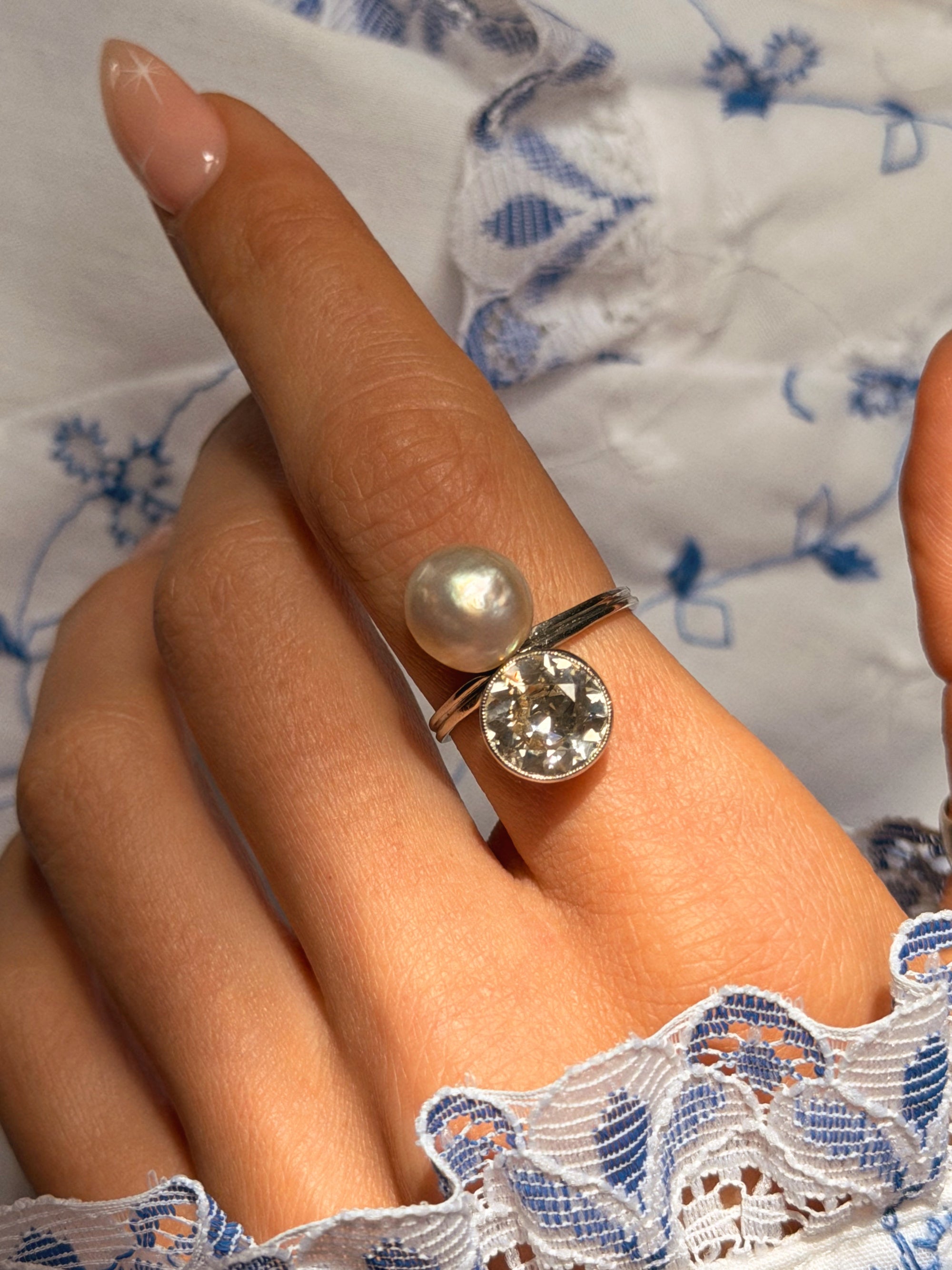 I BELIEVE THE SEA MADE THIS FOR ME SO THAT I COULD WATCH IT RISE AND FALL ON YOUR SKIN AS YOU DOZED BY THE ROCKS // ART DECO DIAMOND AND PEARL TOI ET MOI RING