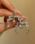 THE MOST BEAUTIFUL ALIEN CAME TO ME ON A MOONBEAM AND DANCED ALL NIGHT LONG // REPURPOSED DECO DIAMOND AND MOONSTONE CHANDELIER EARRINGS