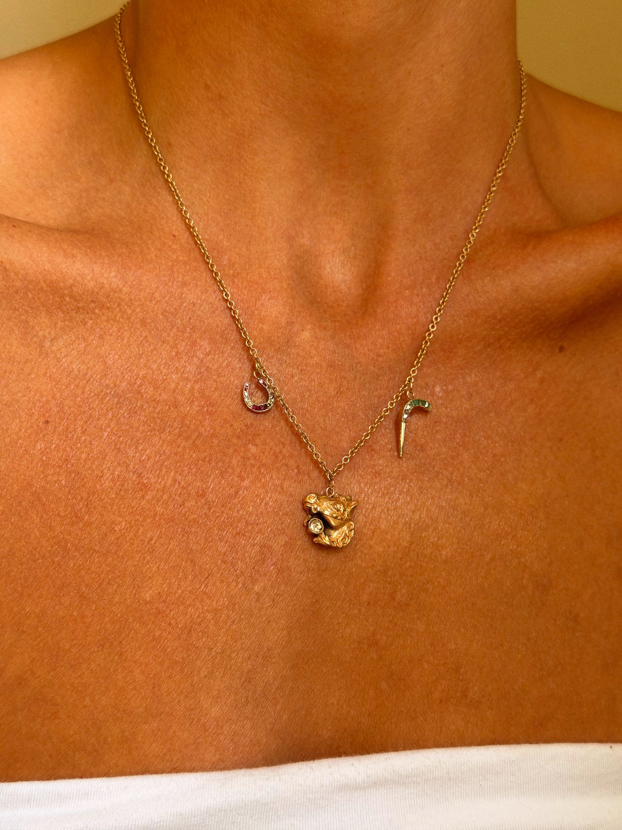 A HORSE WITH NO NAME // ART DECO CHARM NECKLACE WITH HORSE, WHIP AND HORSESHOE
