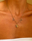 A HORSE WITH NO NAME // ART DECO CHARM NECKLACE WITH HORSE, WHIP AND HORSESHOE