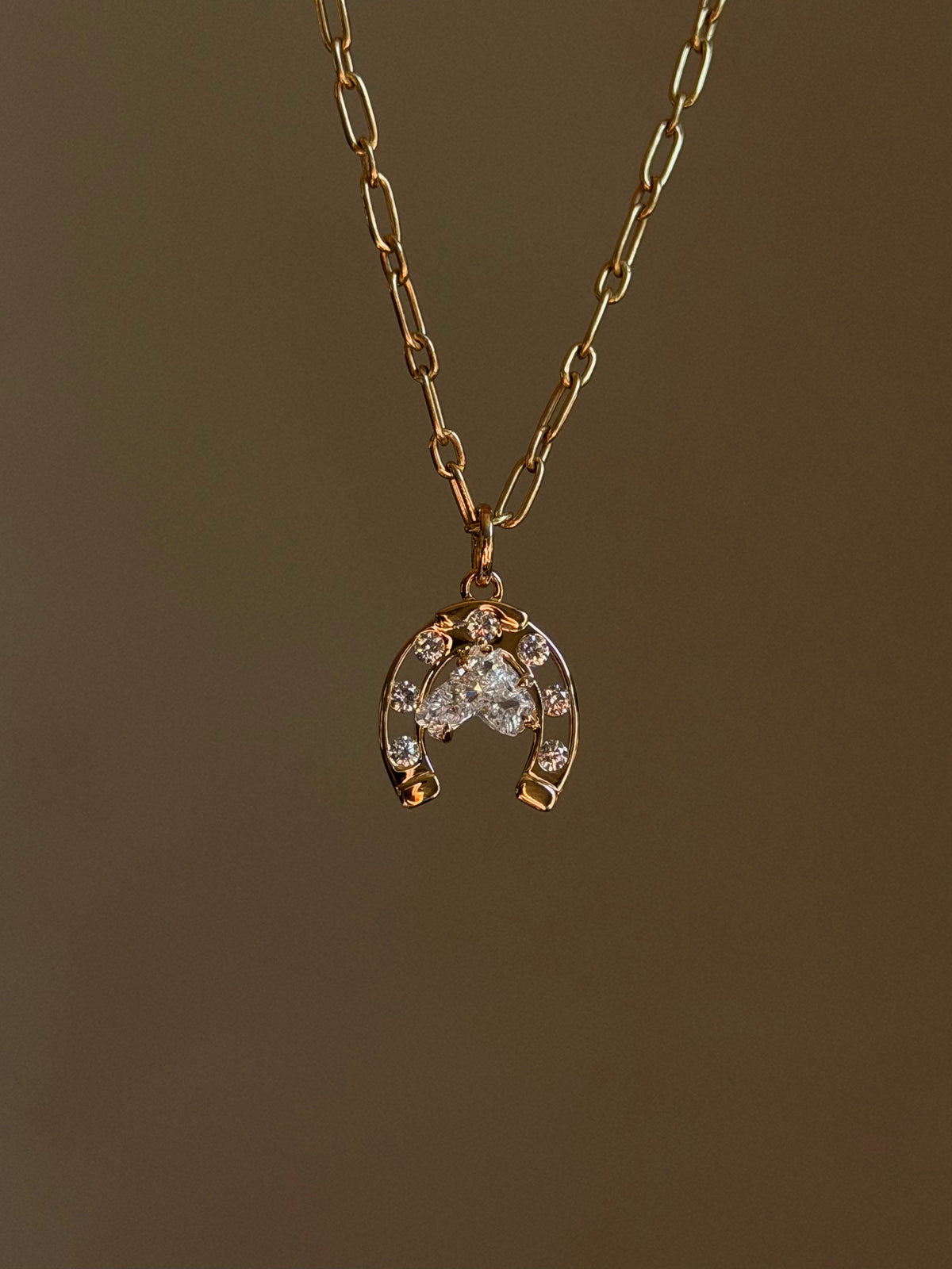 SOME CALL IT LUCKY BUT I THINK IT HAS TO DO WITH A WILL UNBROKEN // DIAMOND HORSE HEAD AND LUCKY SEVEN HORSESHOE PENDANT