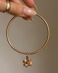 I CARRY LUCK WITH ME WHEREVER I GO // VINTAGE 18K GOLD BANGLE WITH FOUR LEAF CLOVER