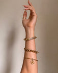 I CARRY LUCK WITH ME WHEREVER I GO // VINTAGE 18K GOLD BANGLE WITH FOUR LEAF CLOVER