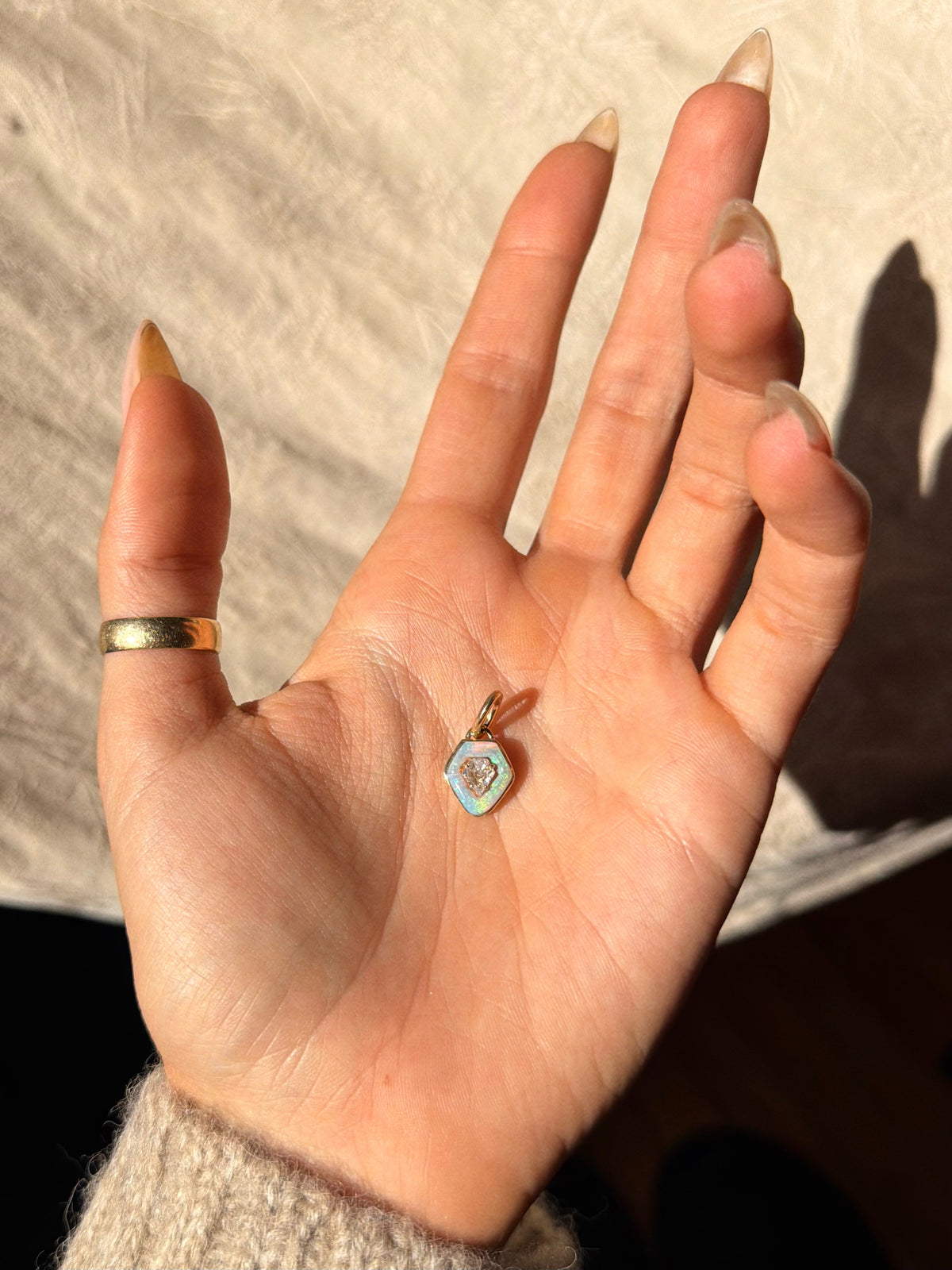 THERE IS THIS STRONG HALO AROUND YOUR HEART, LIKE A SHIELD OF LOVE // DIAMOND SHIELD PENDANT WITH OPAL HALO