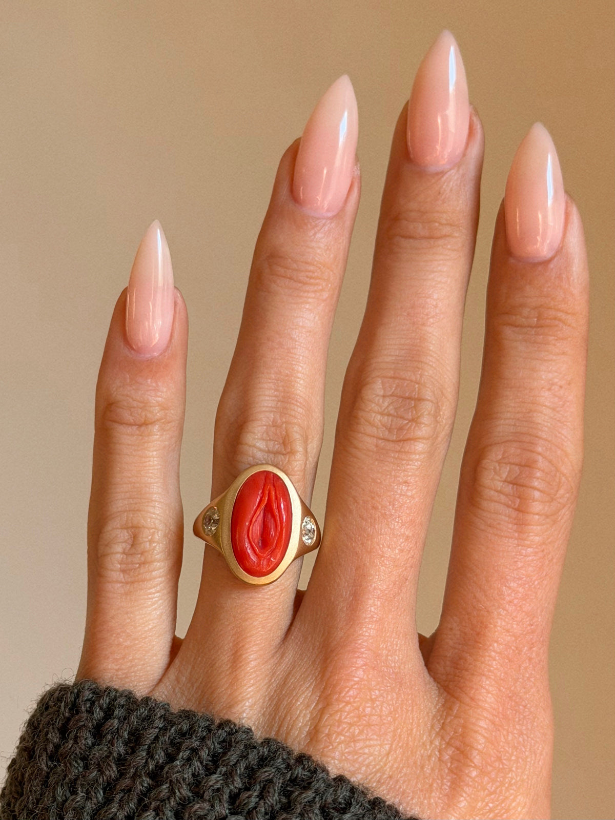 I AM A LIFE BIRTHER, A PORTAL BETWEEN WHAT IS KNOWN AND UNKNOWN AND I WILL BE CELEBRATED AS SUCH // HAND CARVED CORAL VULVA SIGNET RING