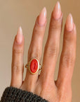 I AM A LIFE BIRTHER, A PORTAL BETWEEN WHAT IS KNOWN AND UNKNOWN AND I WILL BE CELEBRATED AS SUCH // HAND CARVED CORAL VULVA SIGNET RING