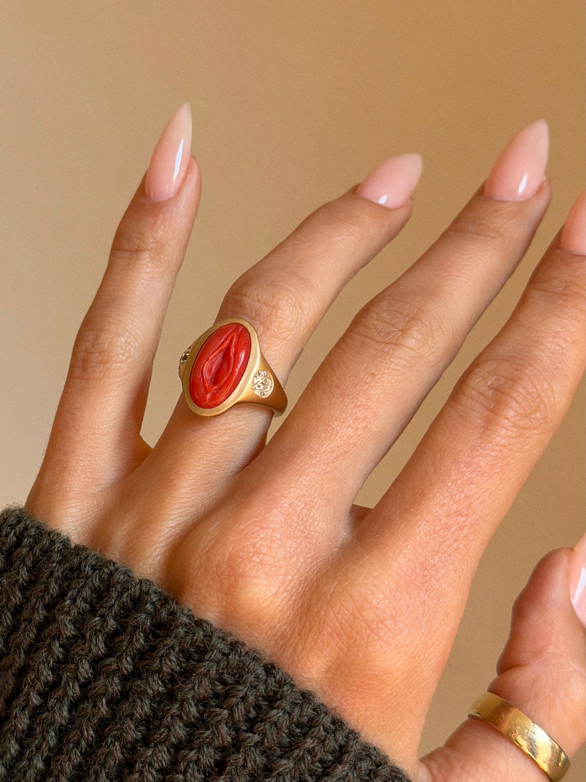 I AM A LIFE BIRTHER, A PORTAL BETWEEN WHAT IS KNOWN AND UNKNOWN AND I WILL BE CELEBRATED AS SUCH // HAND CARVED CORAL VULVA SIGNET RING