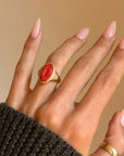 I AM A LIFE BIRTHER, A PORTAL BETWEEN WHAT IS KNOWN AND UNKNOWN AND I WILL BE CELEBRATED AS SUCH // HAND CARVED CORAL VULVA SIGNET RING