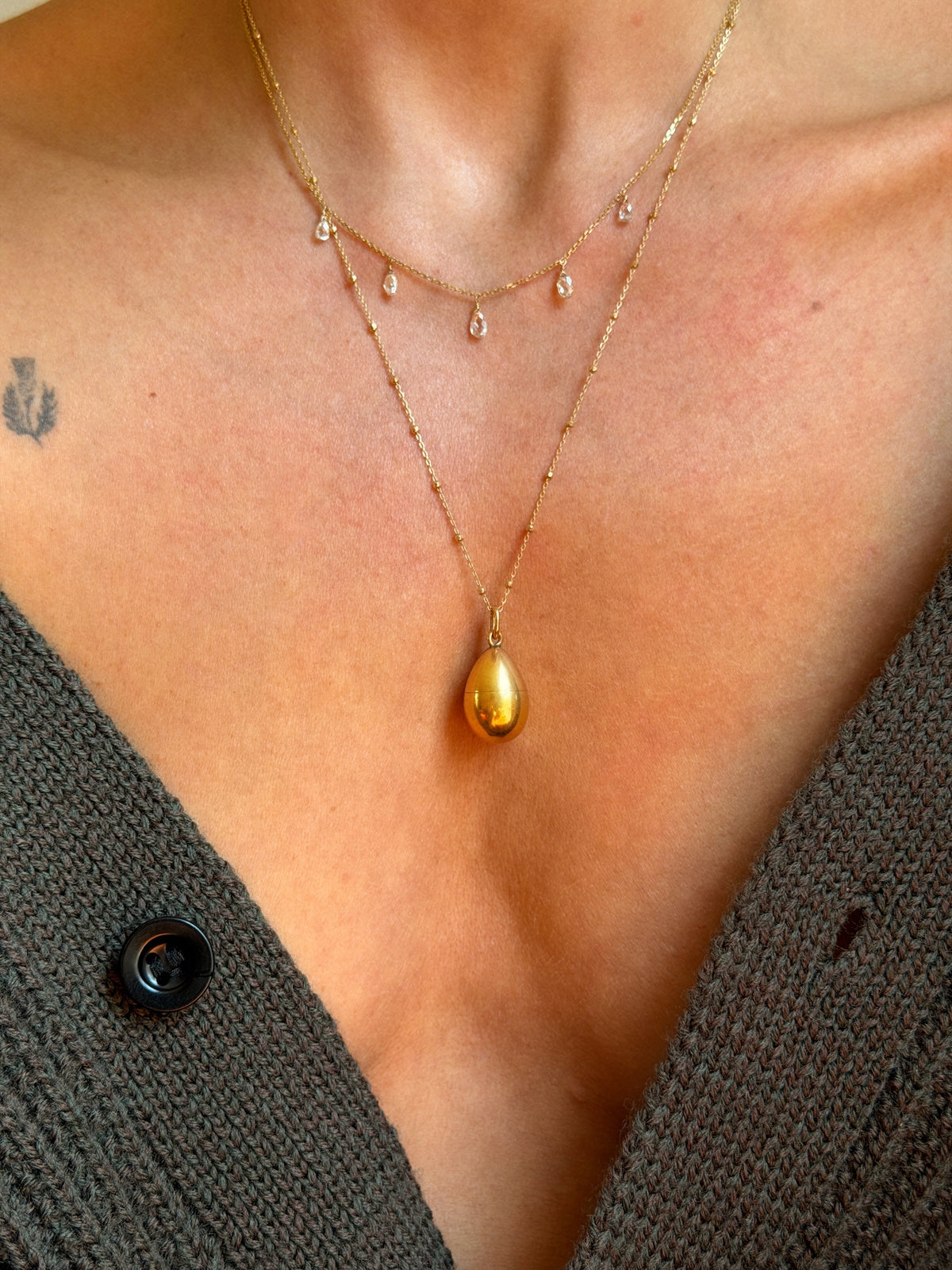 WHISPER TO ME THE THINGS YOU CAN'T SAY ALOUD SO I CAN HOLD THEM TIGHTLY AND CLOSE TO MY HEART // ANTIQUE GOLDEN RUSSIAN EGG PENDANT