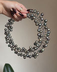 OF VENUS AS THE MOON LIGHTS UP THE DARK, UNDULATING WAVES // TAHITIAN PEARL AND SILVER COLLAR