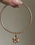 I CARRY LUCK WITH ME WHEREVER I GO // VINTAGE 18K GOLD BANGLE WITH FOUR LEAF CLOVER
