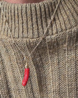 SHE'S JUST GOT THIS SMILE LIKE IT'S GOING WELL, YOU KNOW? // HAND CARVED ITALIAN CORAL PHALLIC CHARM