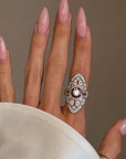OF REASONS TO HAVE A SHIELDED HEART, I HAVE MANY // VINTAGE DIAMOND AND RUBY NAVETTE RING WITH BEAUTIFUL FINGER COVERAGE