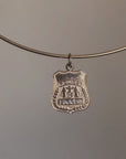 DE-FUND AND RE-EDUCATE // FUCK 'EM POLICE BADGE CHARM
