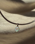 THERE IS THIS STRONG HALO AROUND YOUR HEART, LIKE A SHIELD OF LOVE // DIAMOND SHIELD PENDANT WITH OPAL HALO