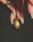 WHISPER TO ME THE THINGS YOU CAN'T SAY ALOUD SO I CAN HOLD THEM TIGHTLY AND CLOSE TO MY HEART // ANTIQUE GOLDEN RUSSIAN EGG PENDANT